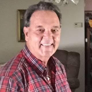 Amidst tools and machinery, Filip Cibor Slusarski shapes solutions with unwavering determination.